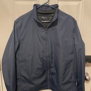 Zachary Prell Navy Jacket with Black Vest inside